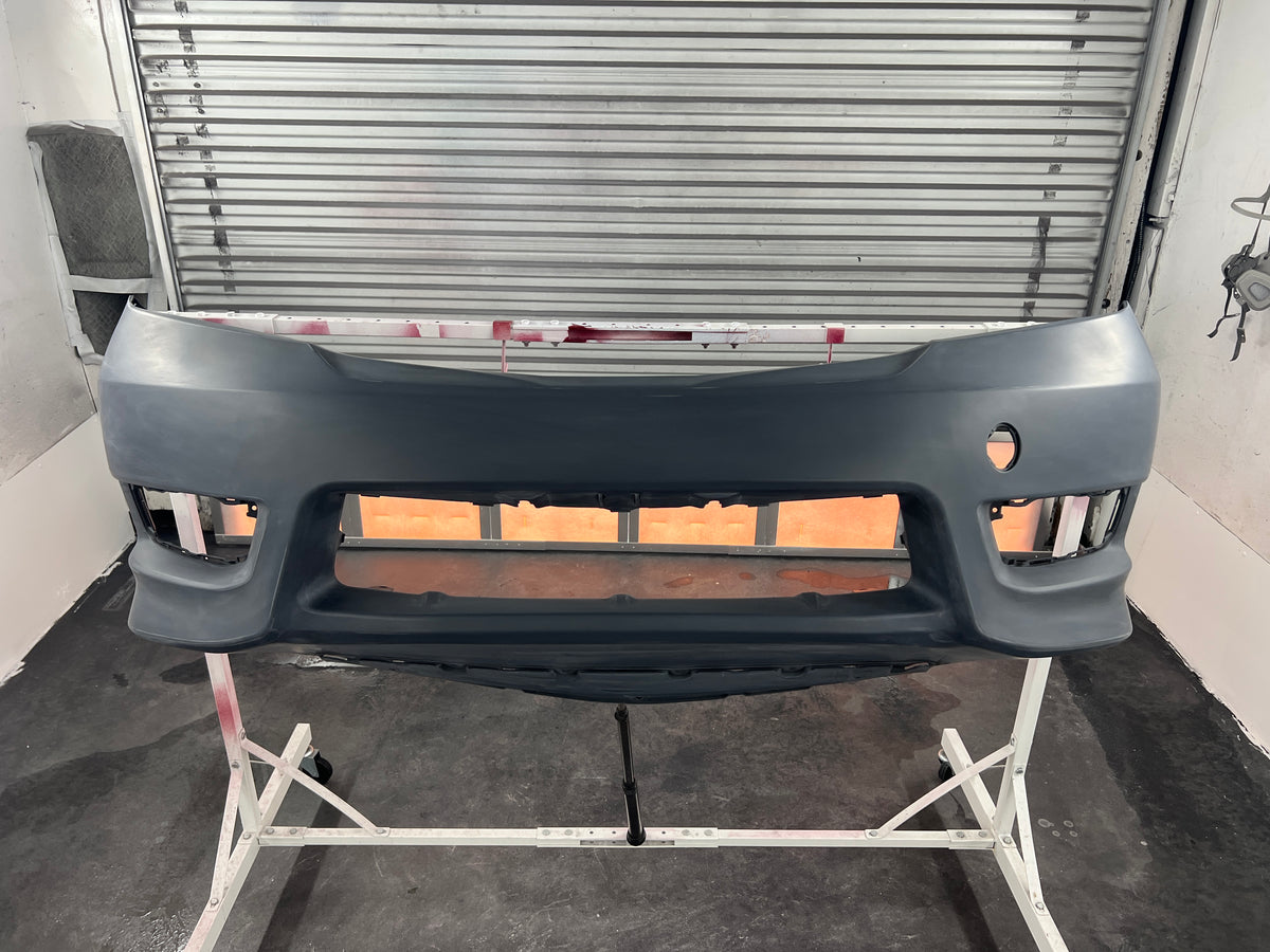 Before: damaged bumper